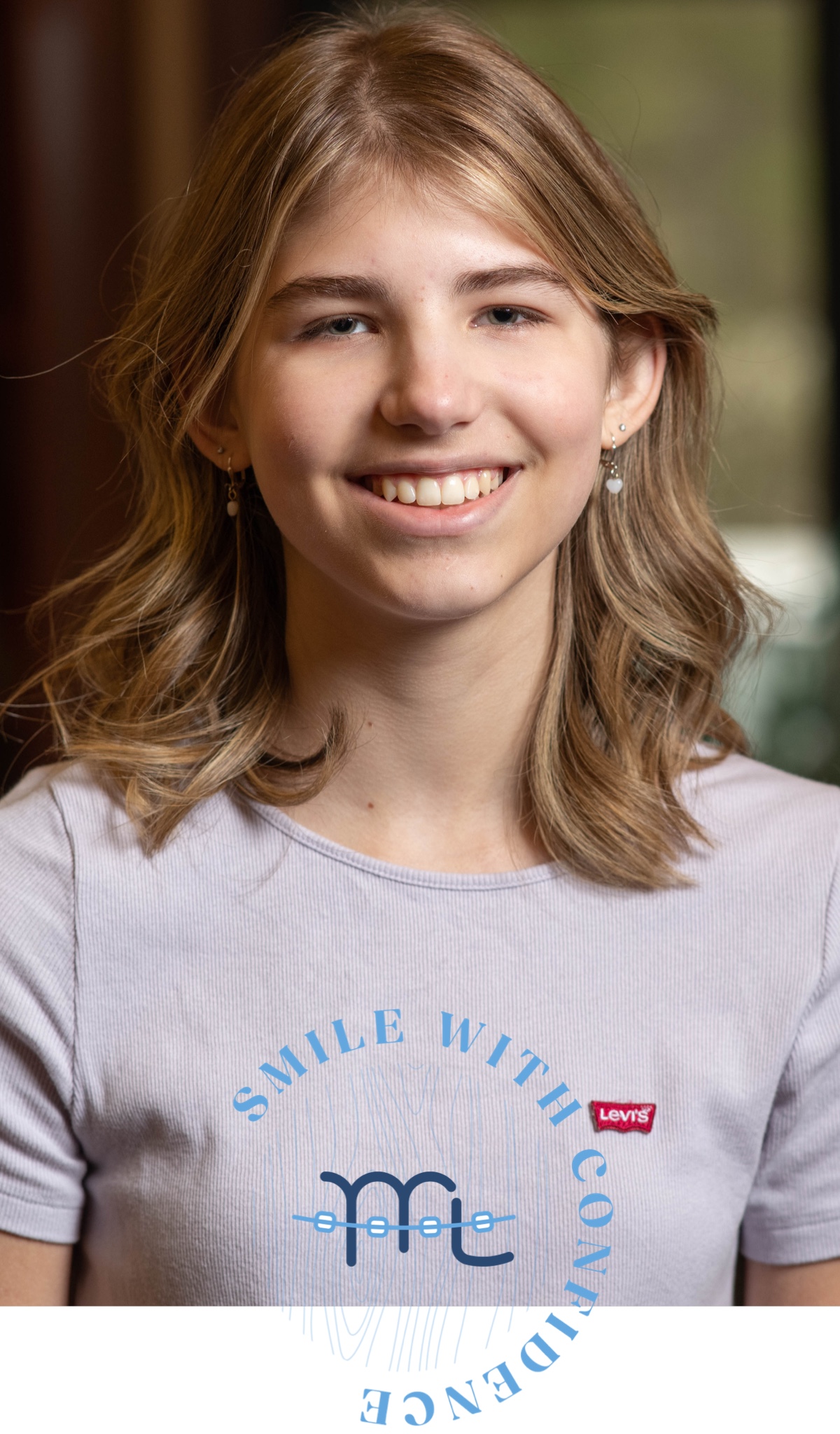teen girl smiling during orthodontic visit