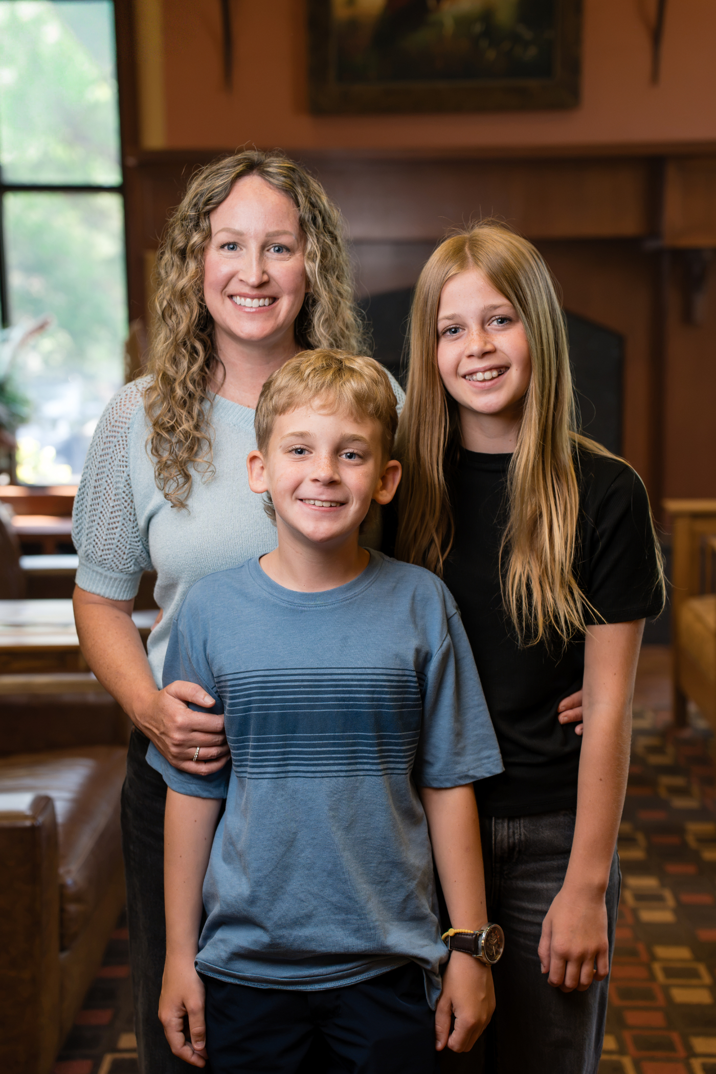 whole family smiling during orthodontic visit